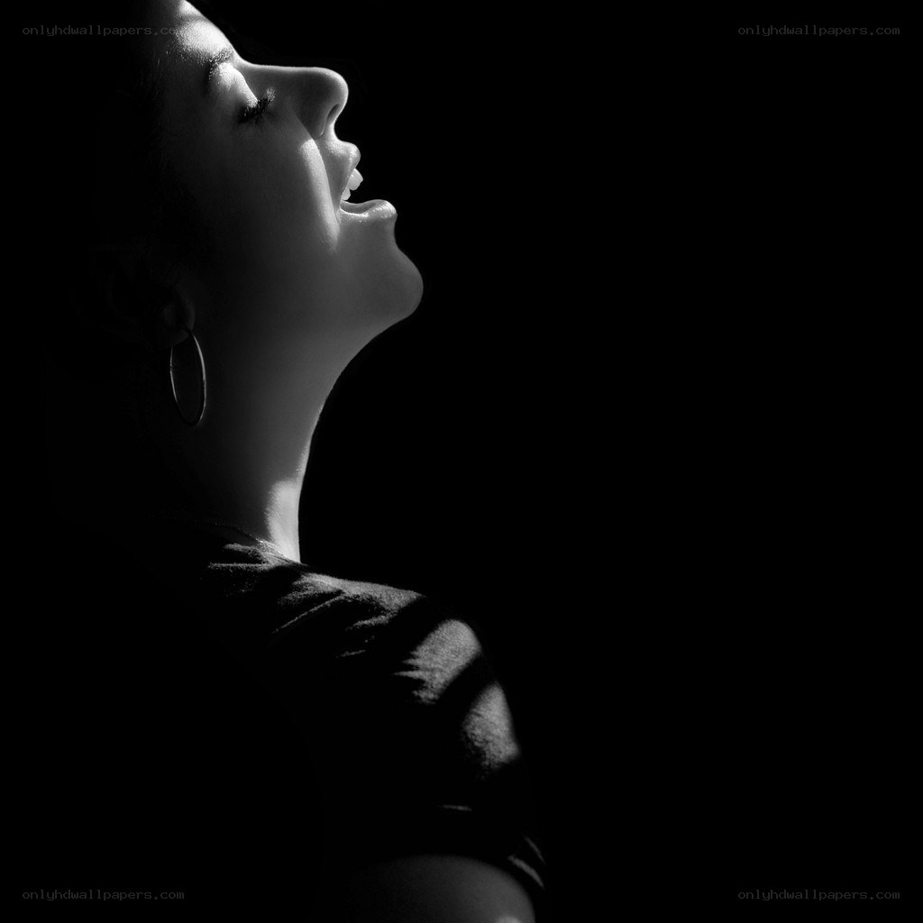 woman singing in profile