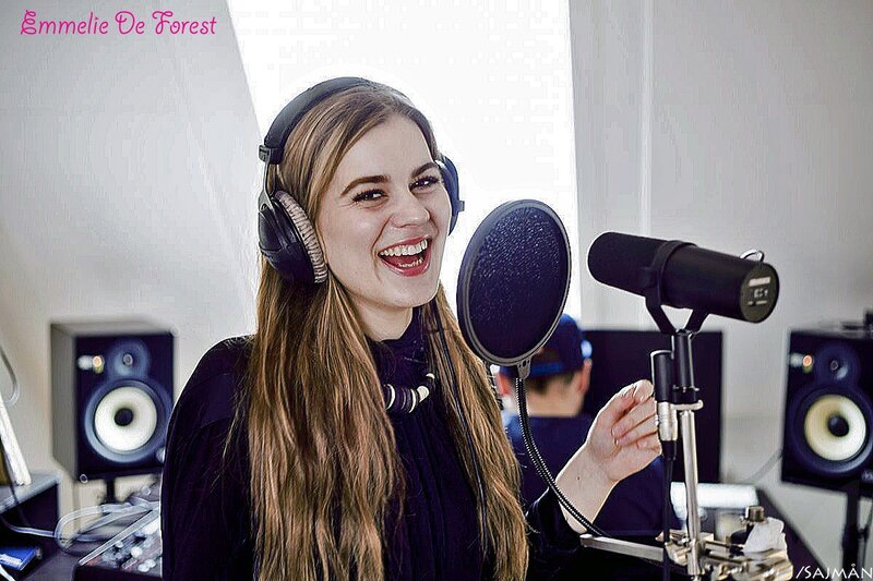 woman singing in recording studio
