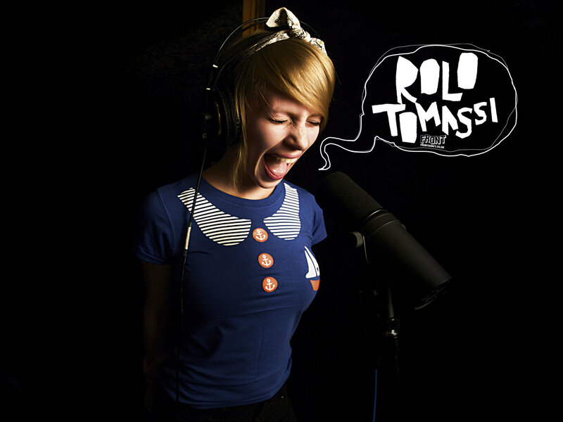 woman singing in recording studio