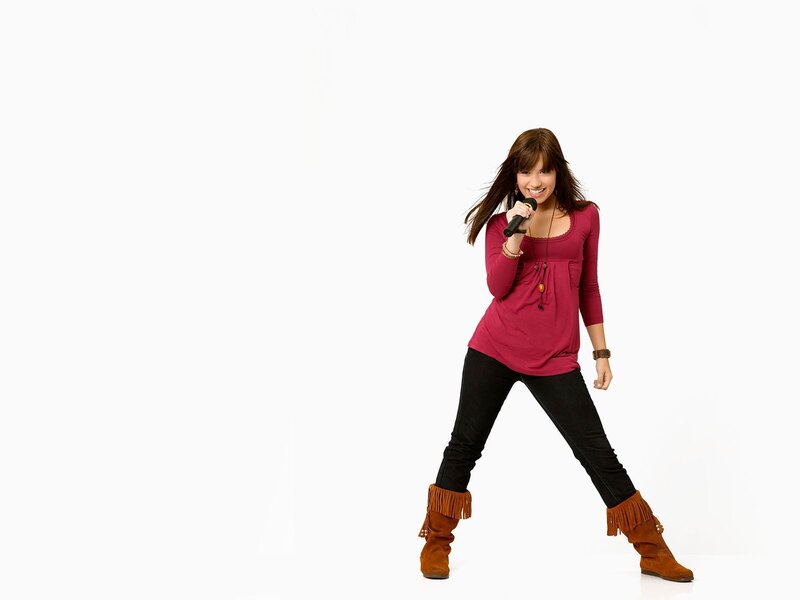 woman singing into microphone