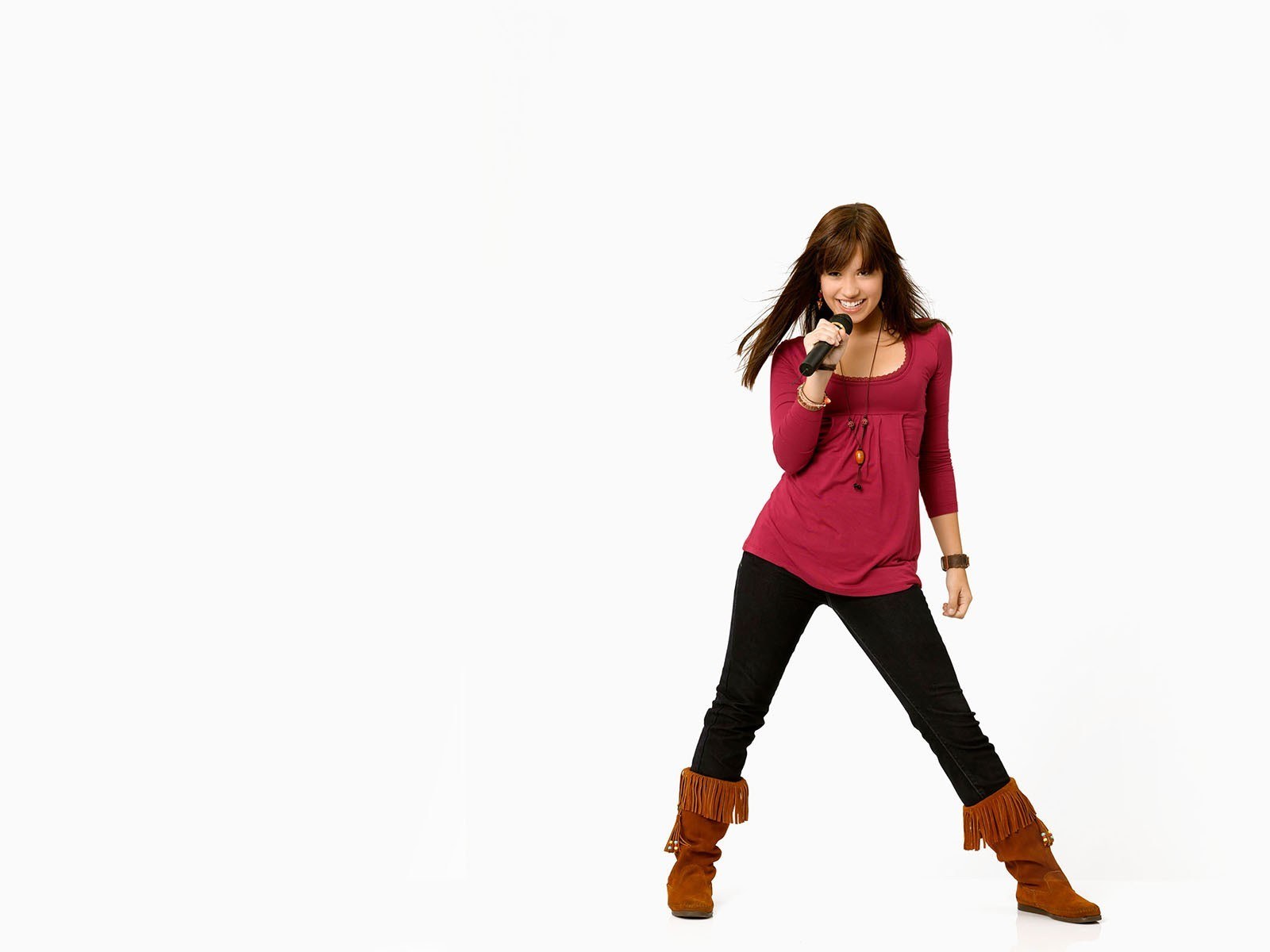 woman singing into microphone
