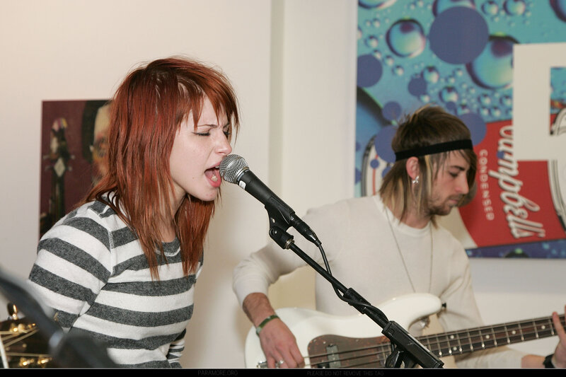 woman singing into microphone