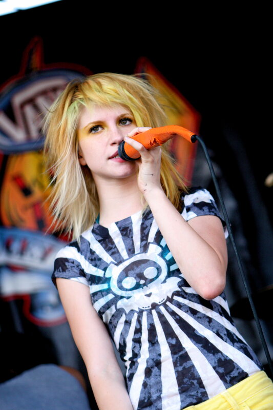 woman singing into microphone