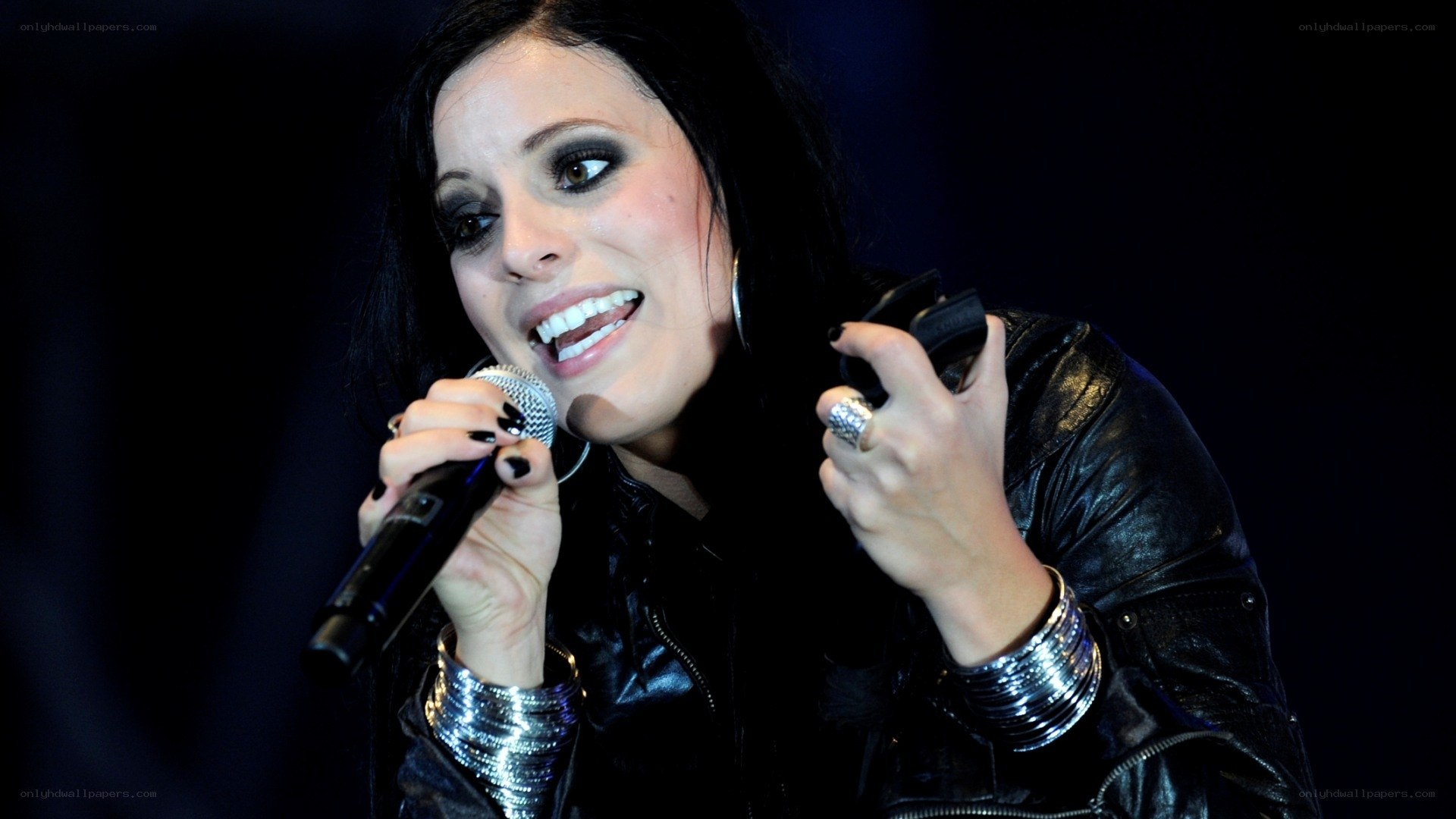 woman singing into microphone