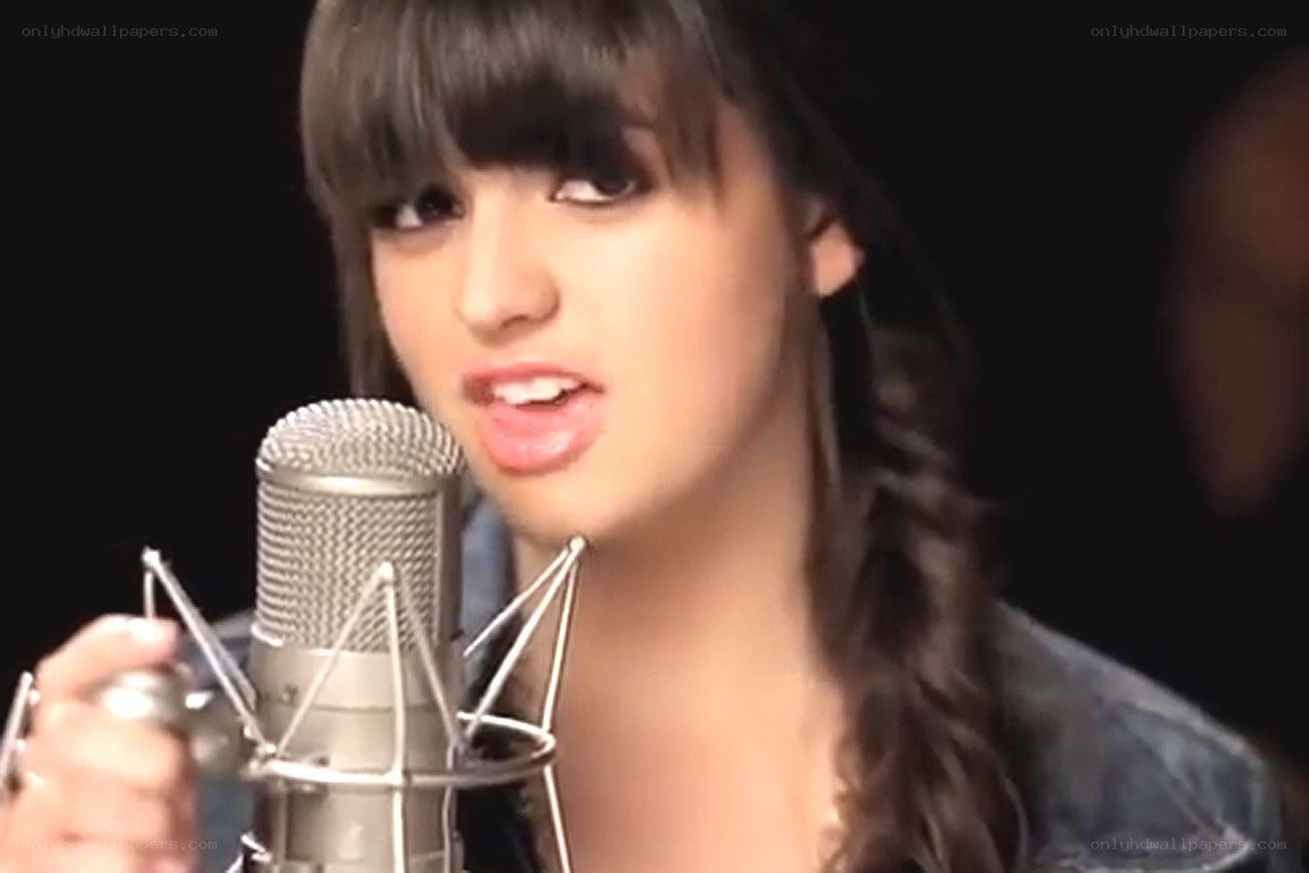 woman singing into microphone