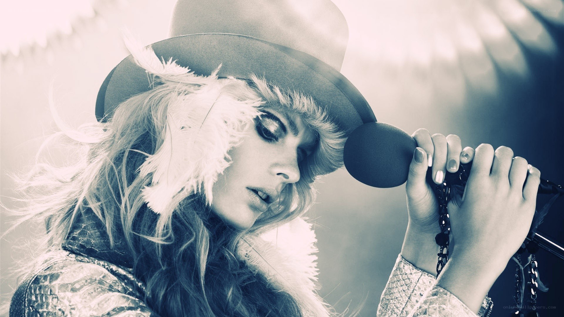 woman singing into microphone