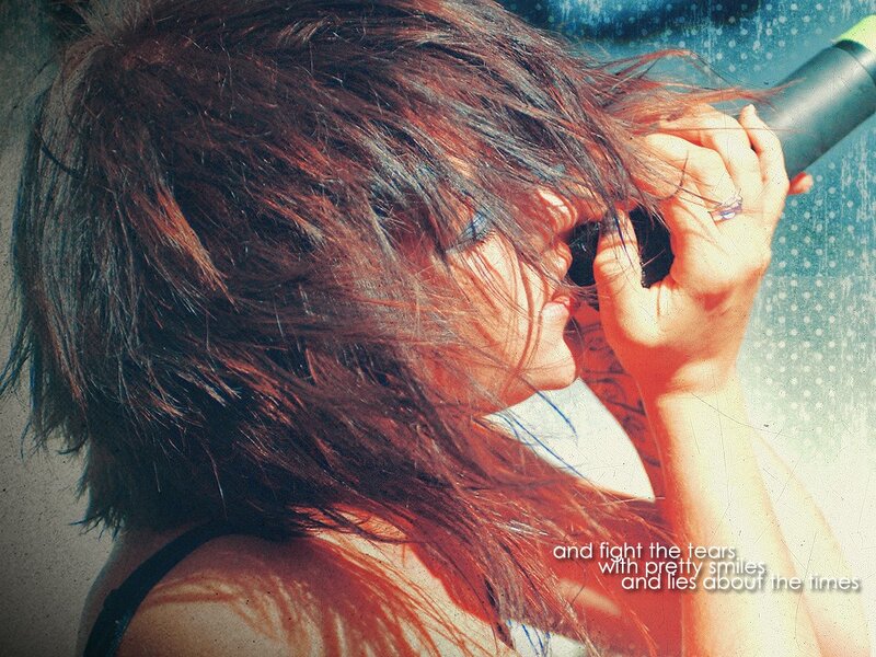 woman singing into microphone