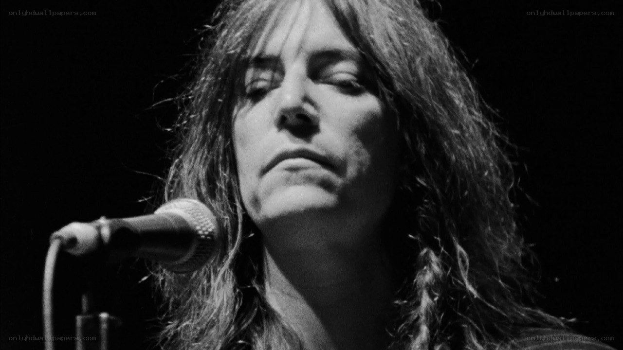 woman singing into microphone