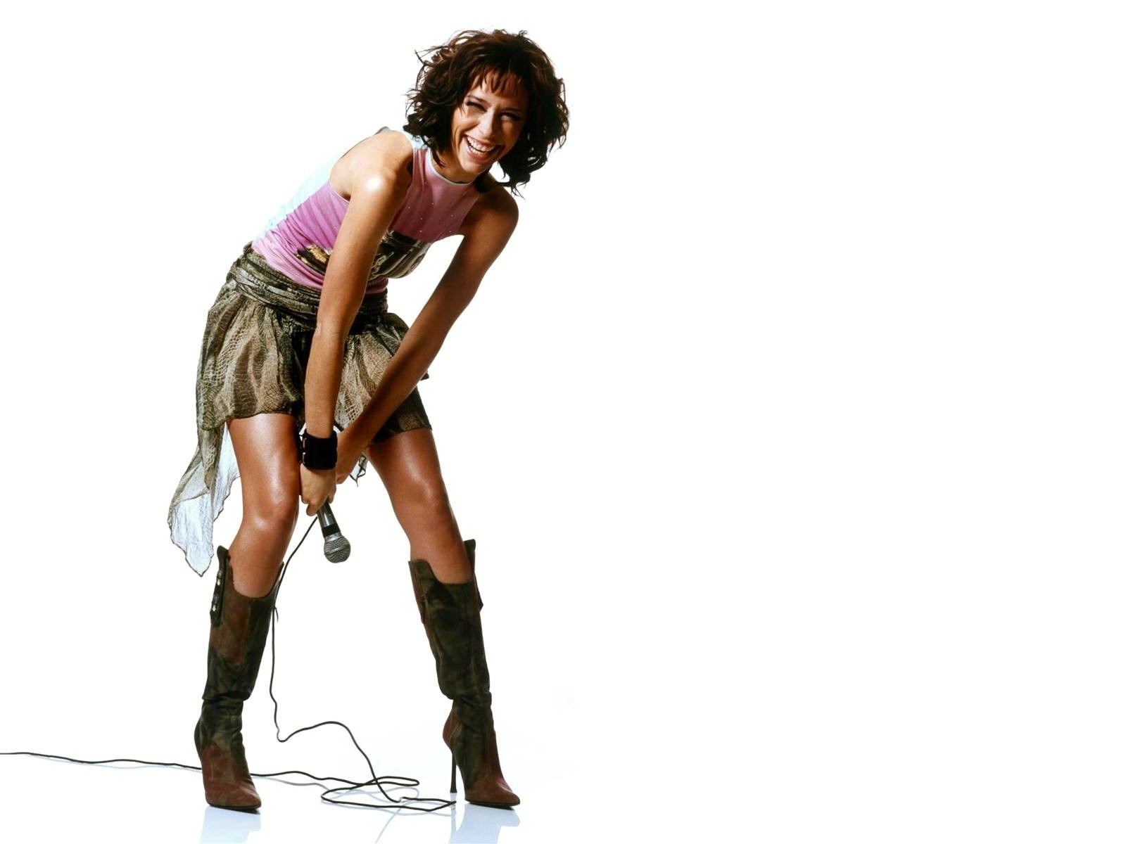 woman singing into microphone