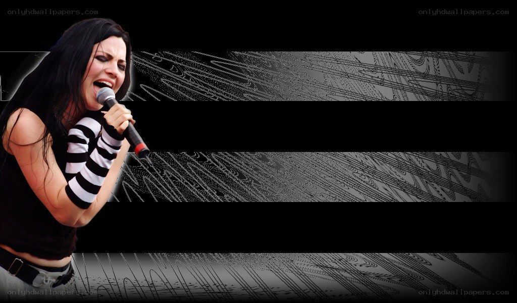 woman singing into microphone