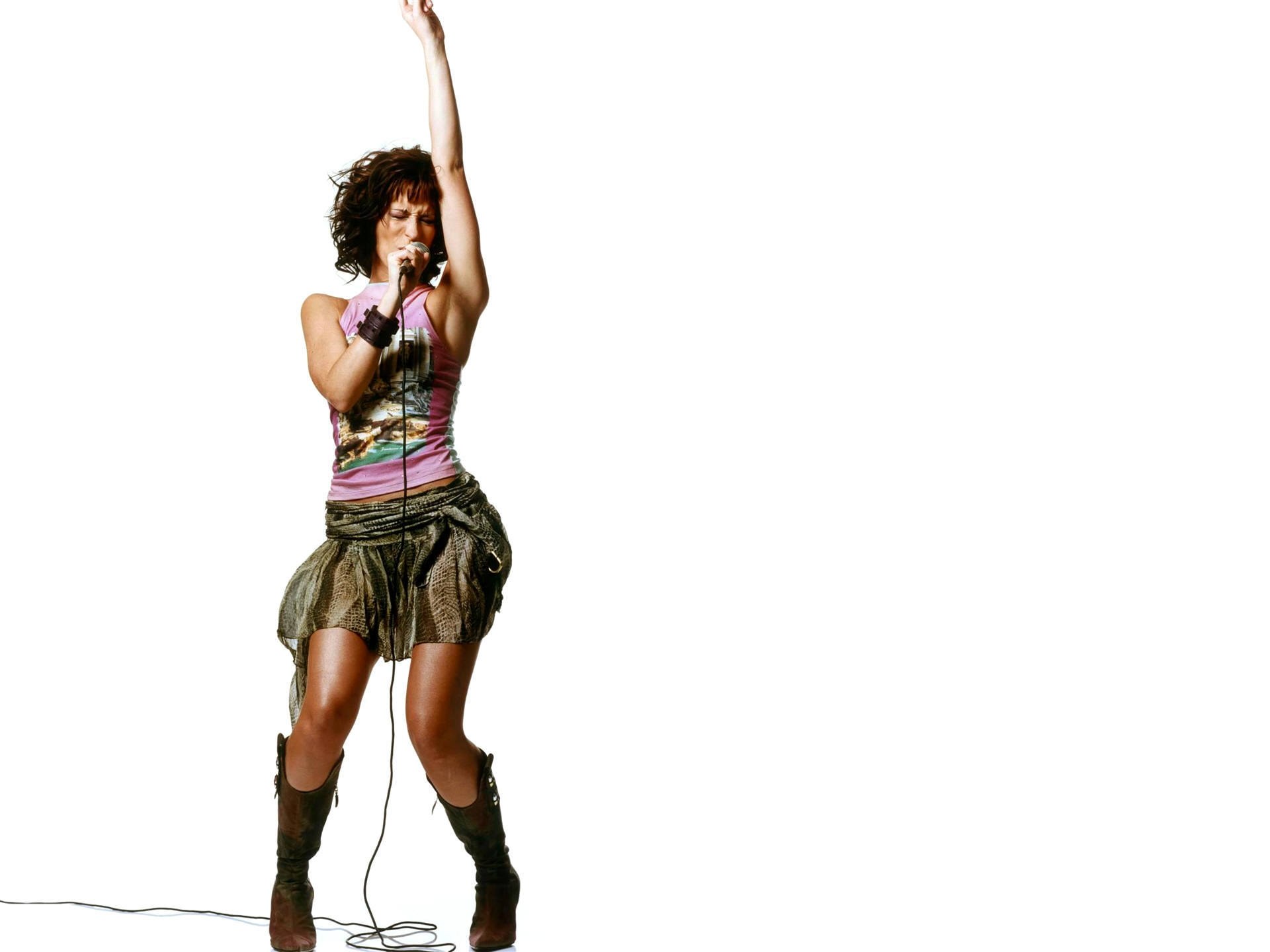 woman singing into microphone