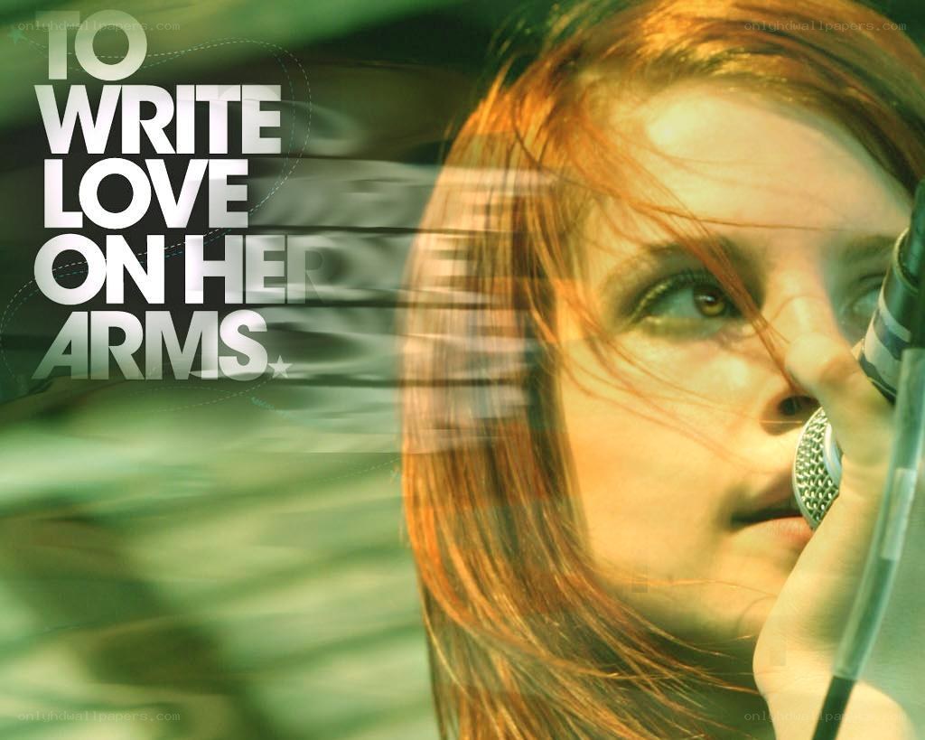 woman singing into microphone