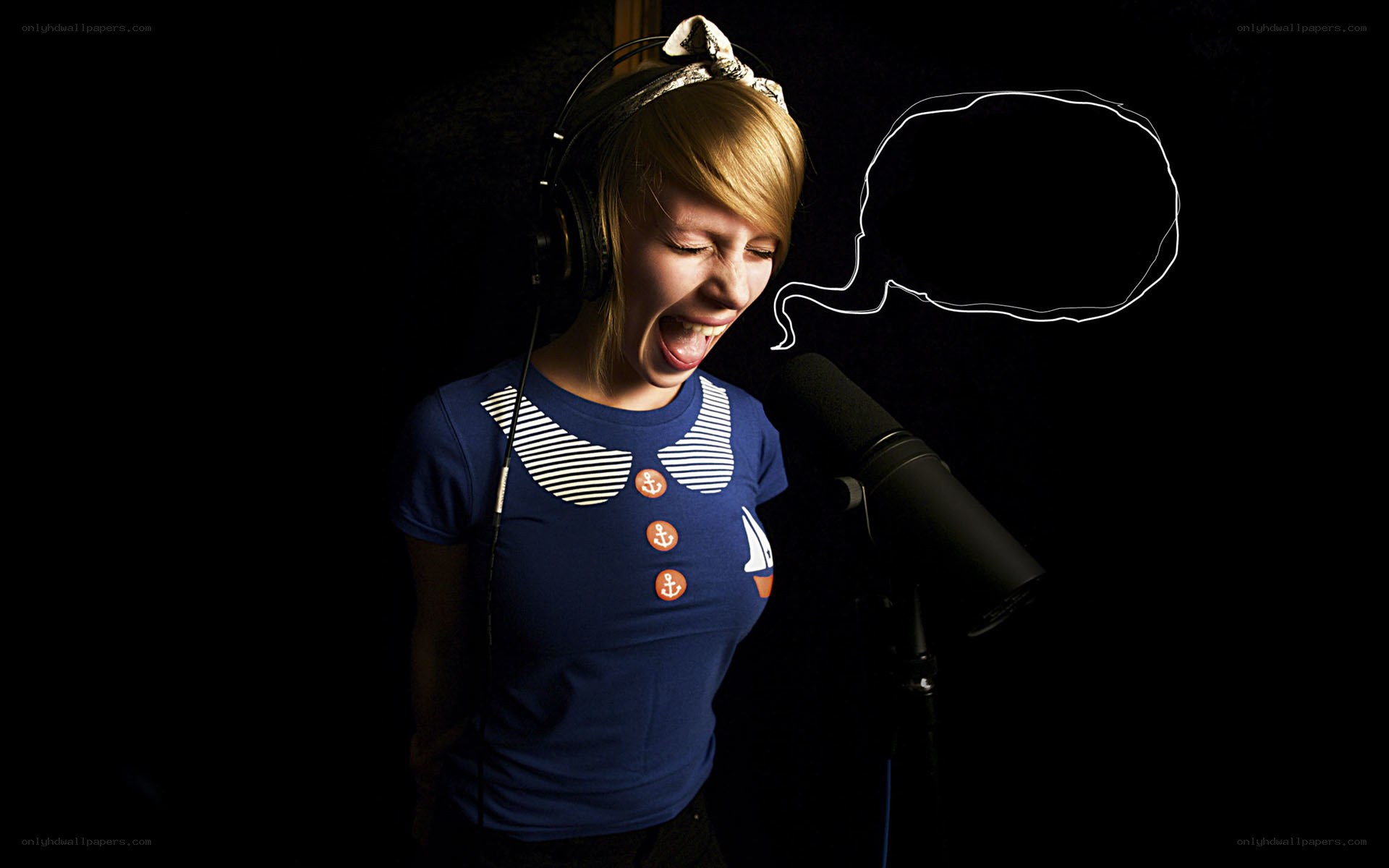 woman singing into microphone