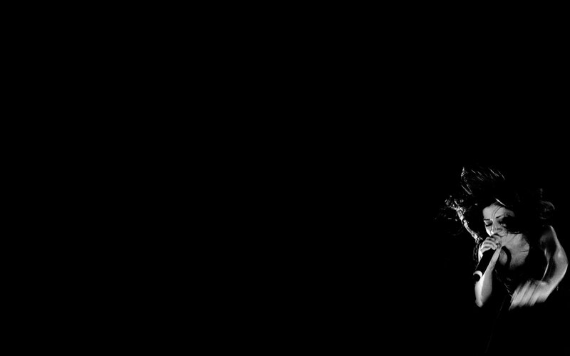 Woman Singing into Microphone — Black, Dramatic, Night, Photograph, Hair, White