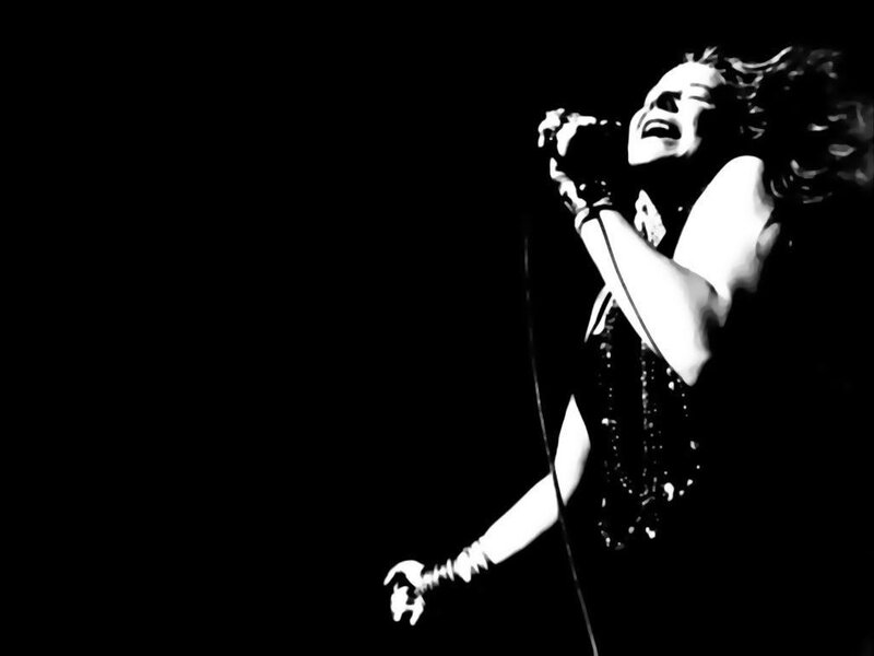 Woman Singing into Microphone — Black, Dramatic, Night, Photograph, Stage Light, Sparkly Dress