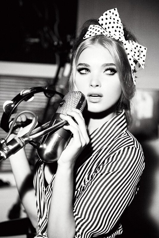 Woman Singing into Microphone — Black, Dramatic, Photograph, Bow