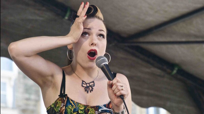 Woman Singing into Microphone — Black, Energetic, Afternoon