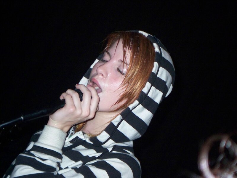 Woman Singing into Microphone — Black, Intense, Night, Photograph, Hoodie
