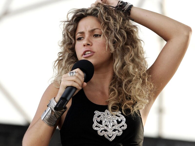Woman Singing into Microphone — Black, Performing