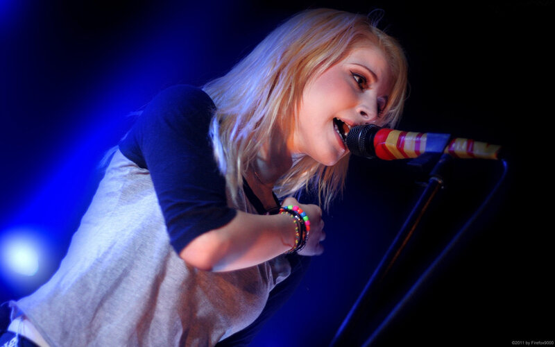 Woman Singing into Microphone — Blue, Dramatic, Night, Photograph