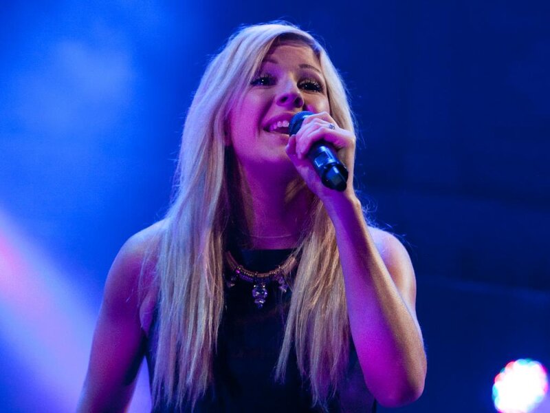 Woman Singing into Microphone — Blue, Lively