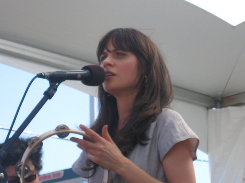 Woman Singing into Microphone — Gray, Performing