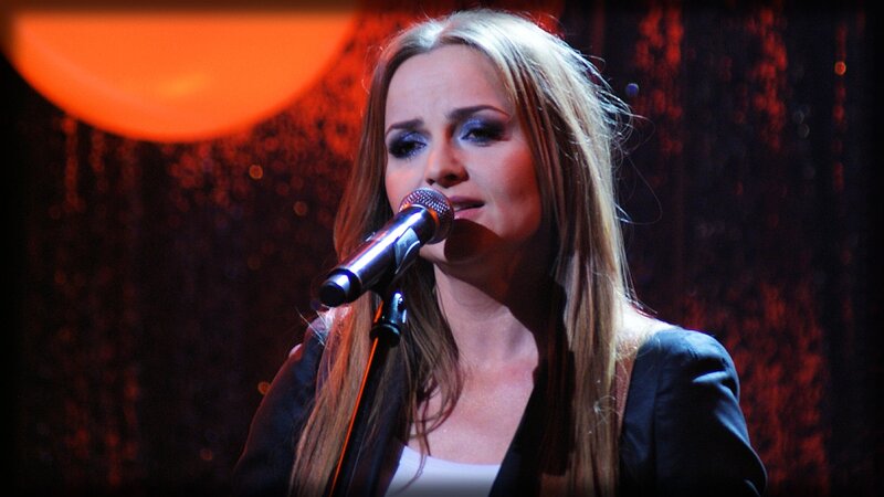 Woman Singing into Microphone — Red, Dramatic, Night, Photograph