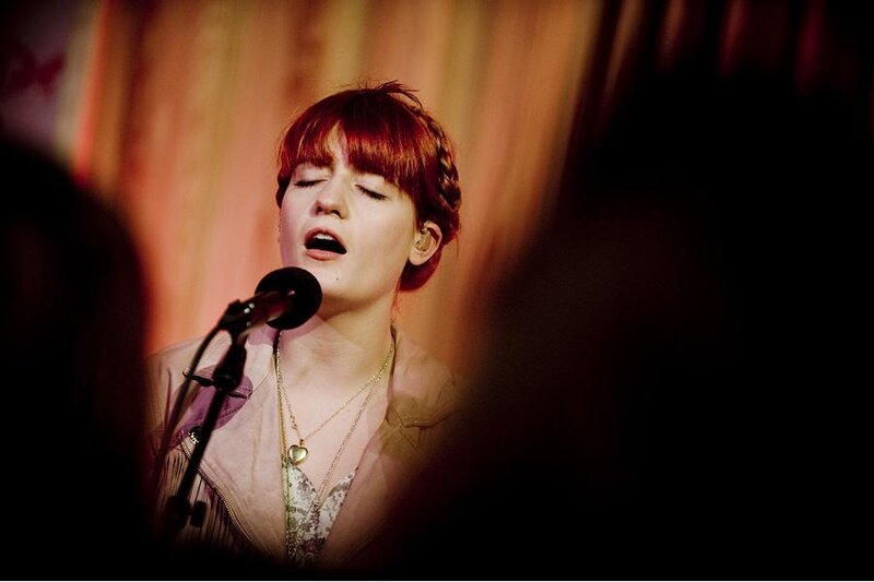Woman Singing into Microphone — Red, Intense, Night