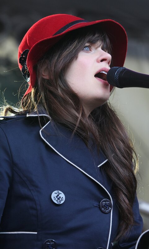 Woman Singing into Microphone — Red, Performing