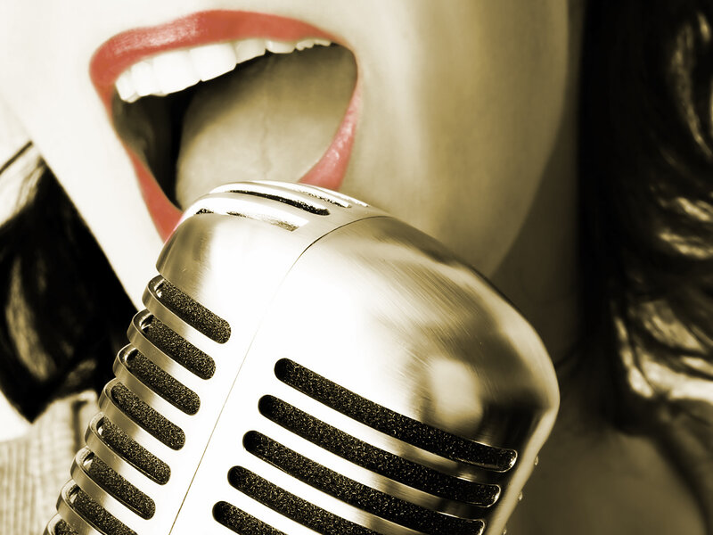 Woman Singing into Microphone — Sepia