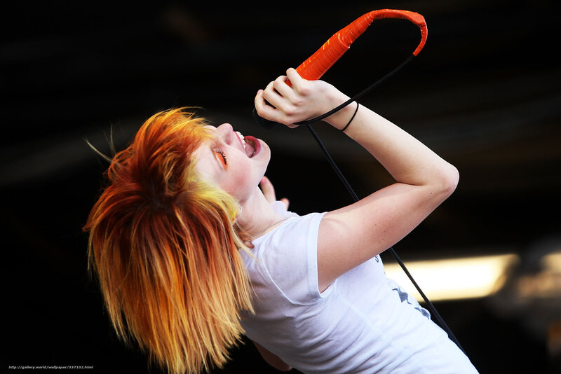Woman Singing into Microphone — White, Energetic, Photograph
