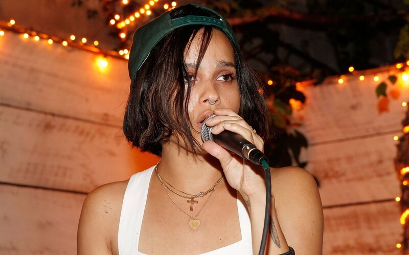 Woman Singing into Microphone — White, Intimate