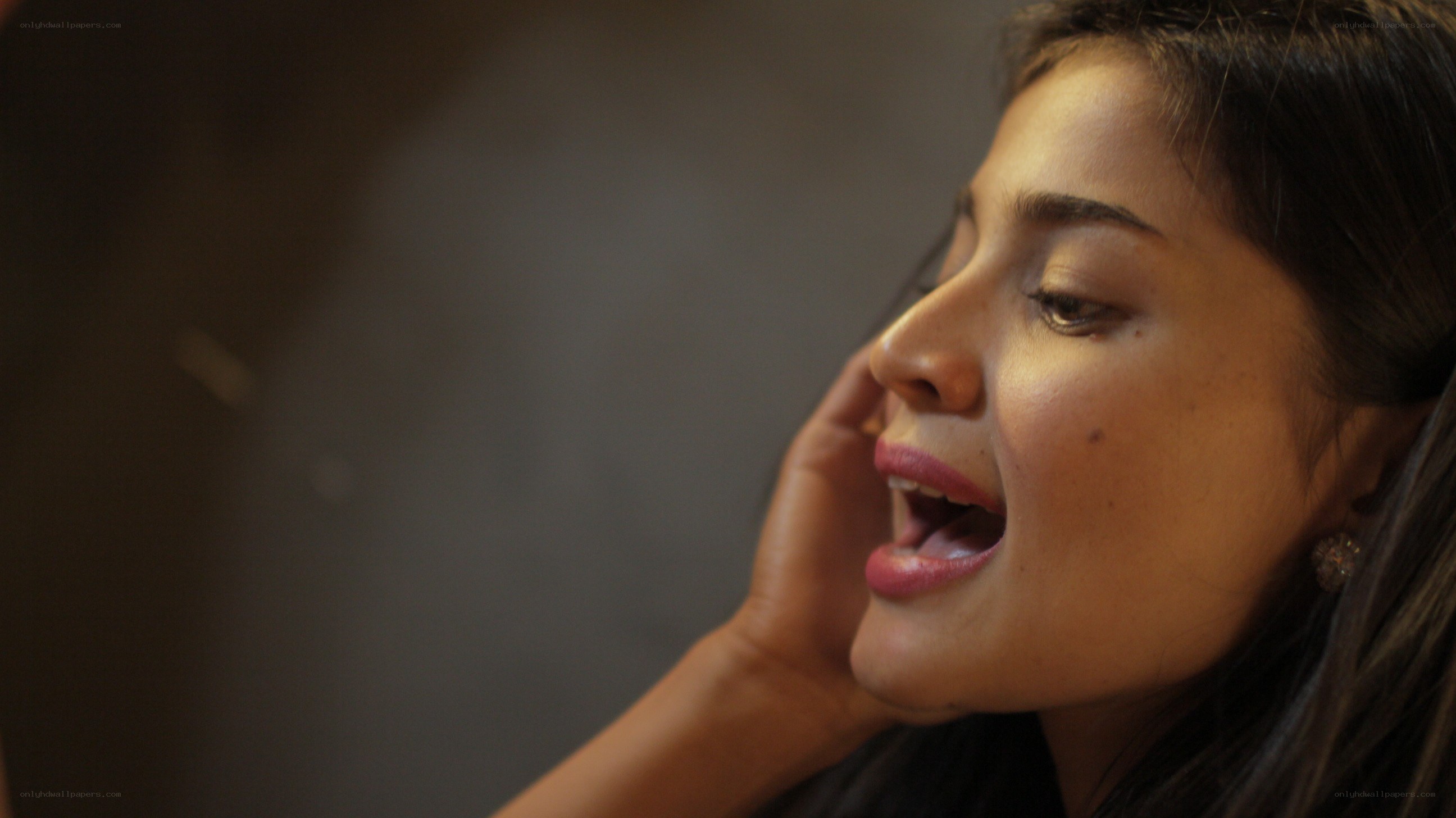 woman singing into phone