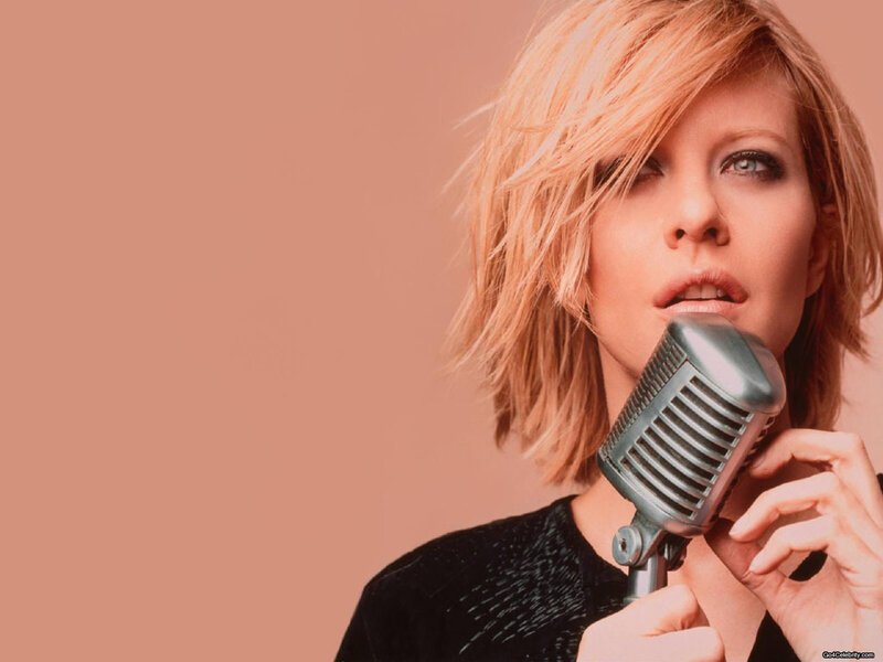 woman singing into vintage microphone