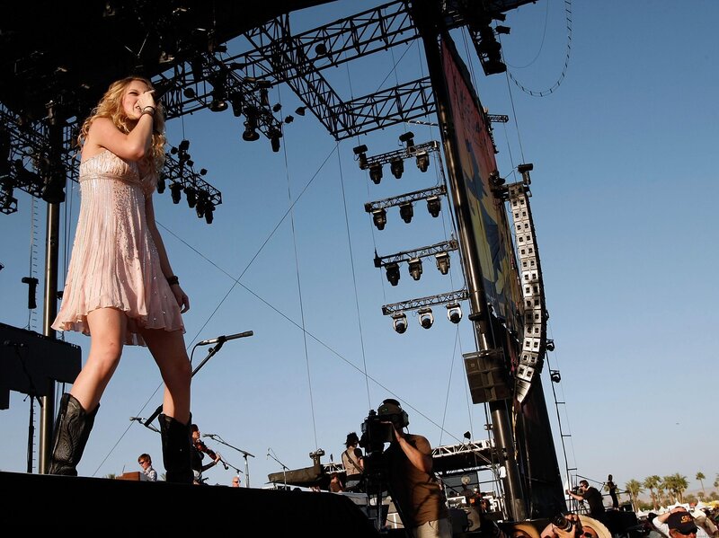 Woman singing on stage