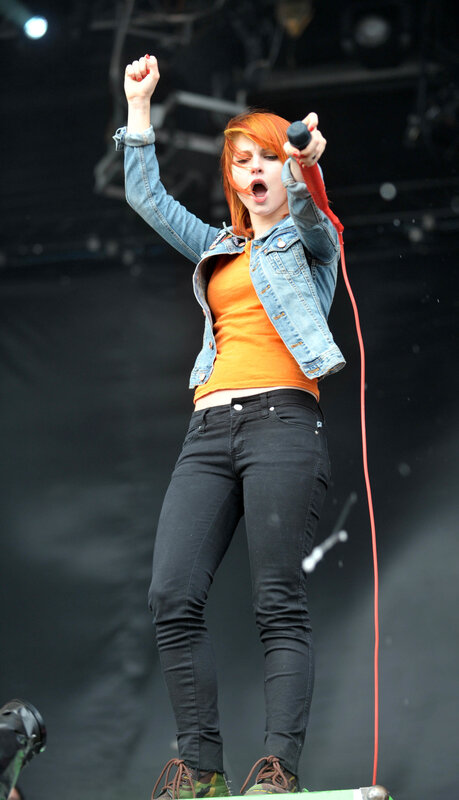 Woman singing on stage