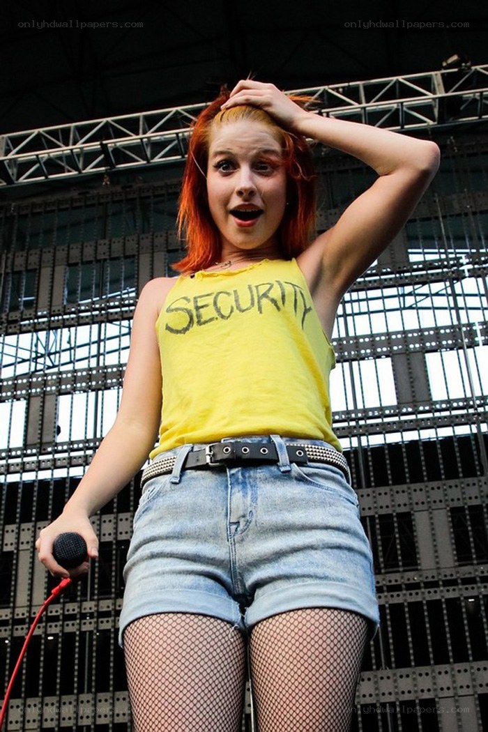 Woman singing on stage