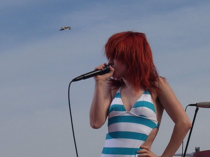 Woman singing on stage