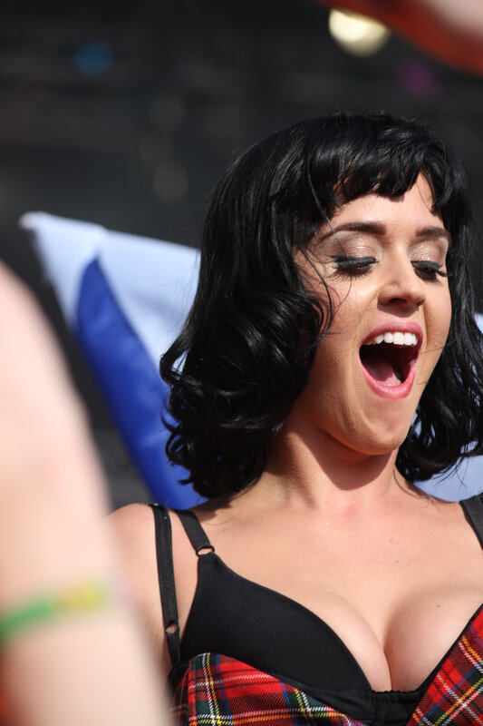 woman singing on stage