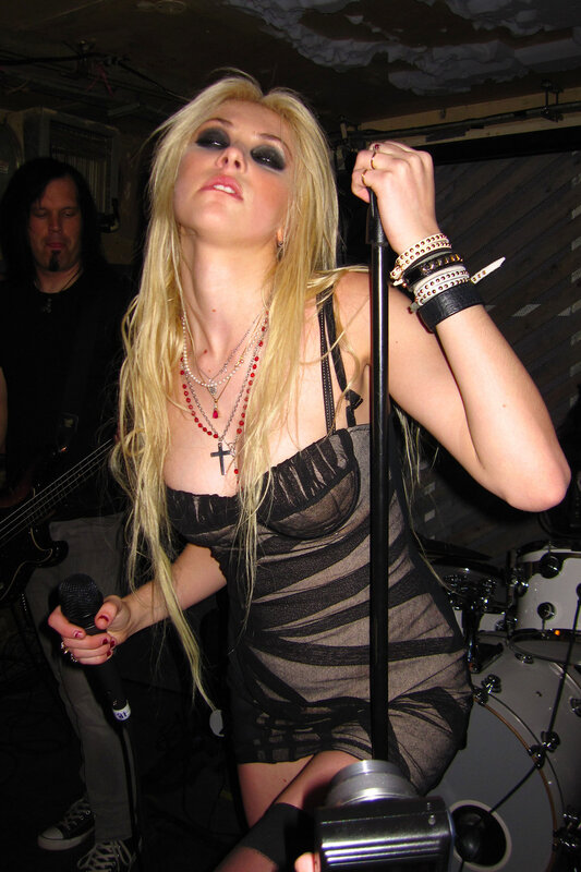 woman singing on stage