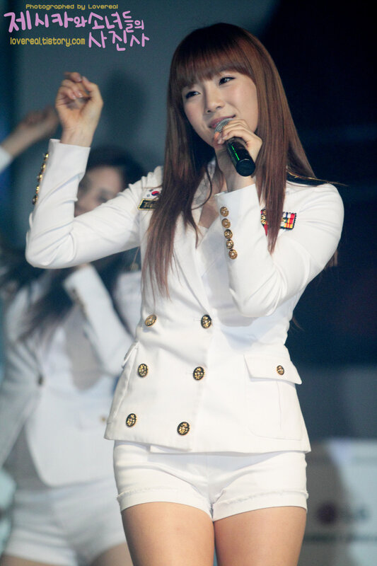 woman singing on stage