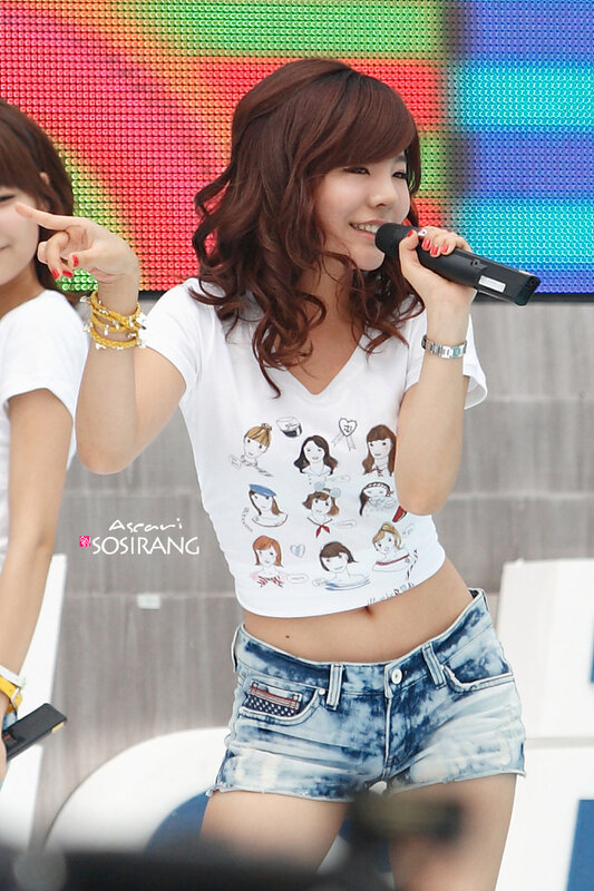 woman singing on stage