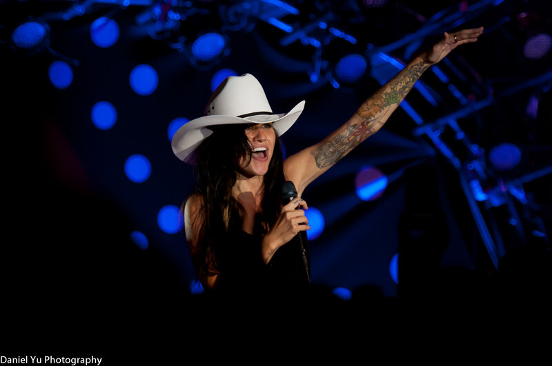 Woman singing on stage