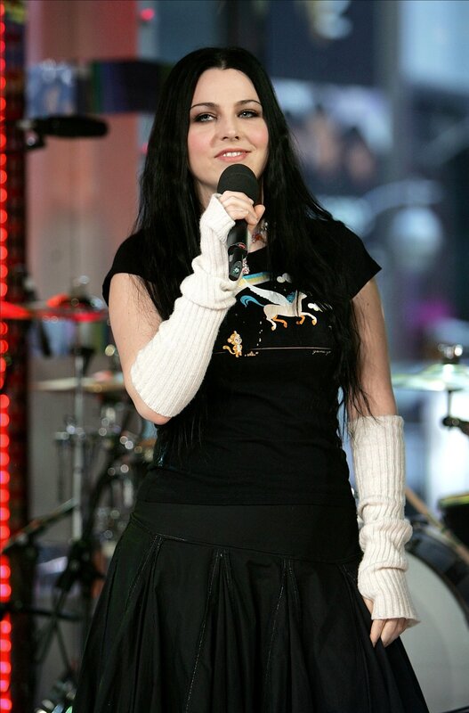 woman singing on stage