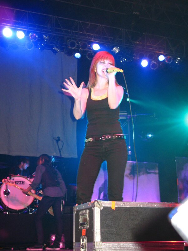 Woman singing on stage