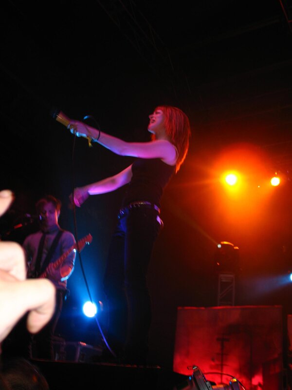 Woman singing on stage