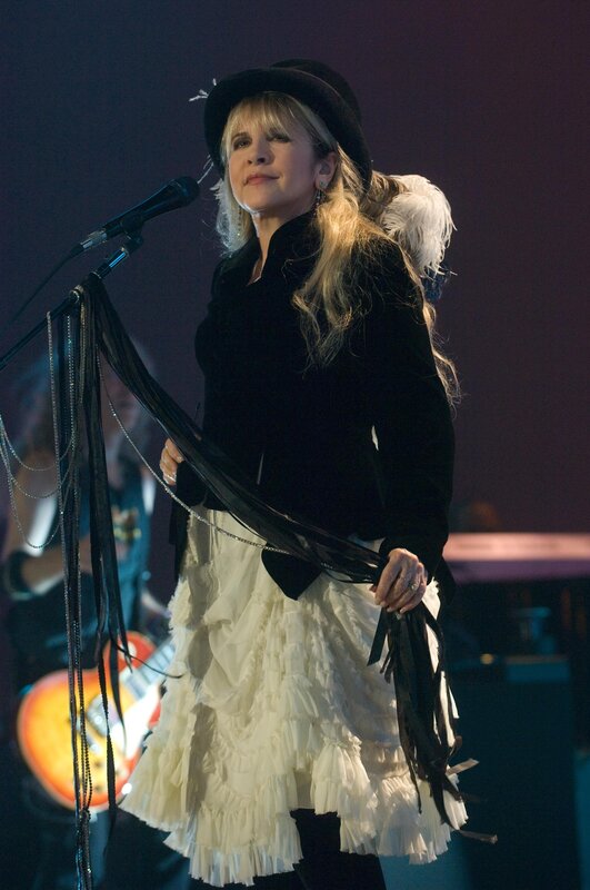 Woman singing on stage