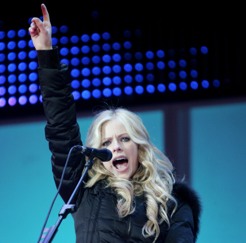 woman singing on stage