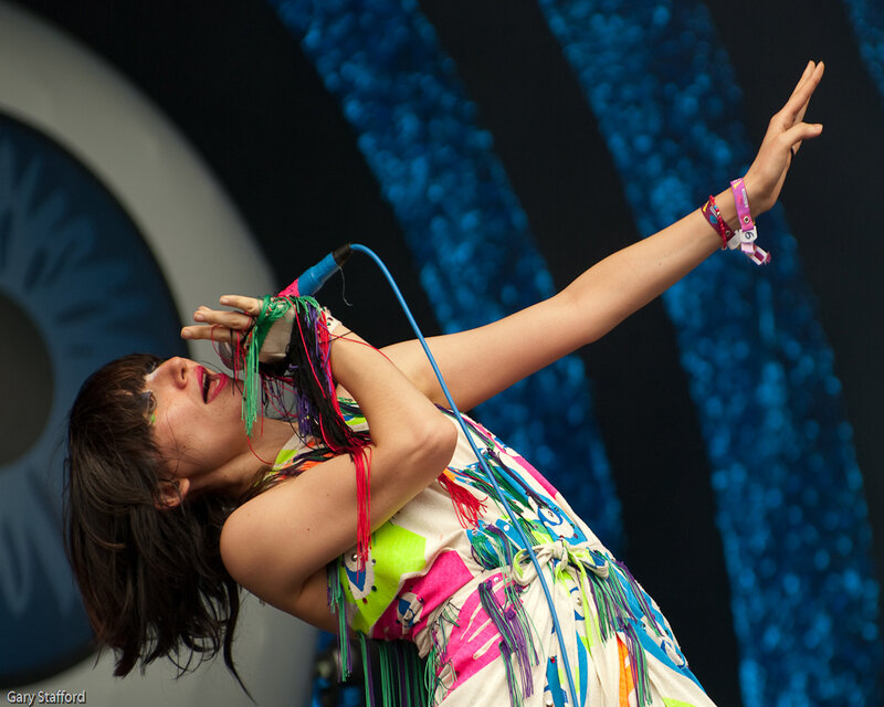 Woman singing on stage