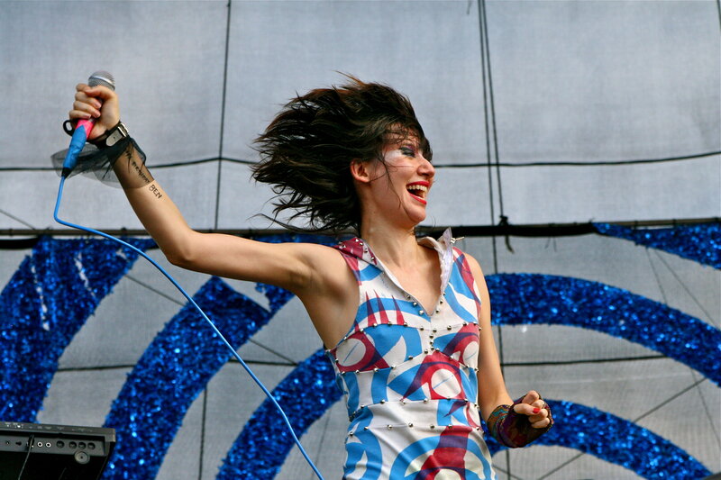 Woman singing on stage